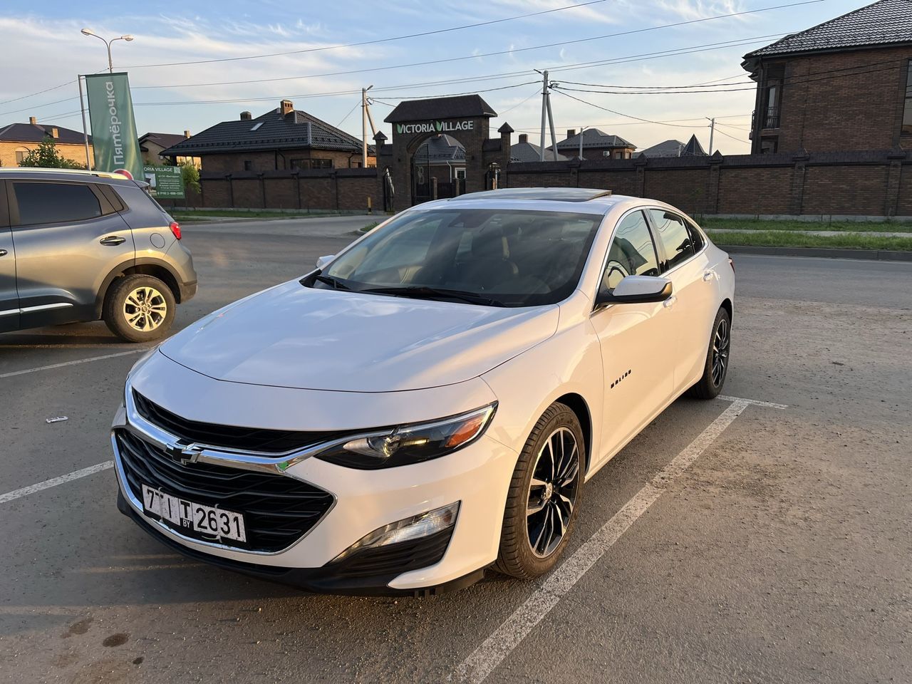 Chevrolet Malibu: фото владельца