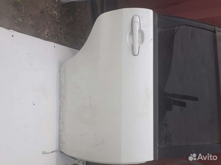 Дверь на сузуки лиана 01-07г.в