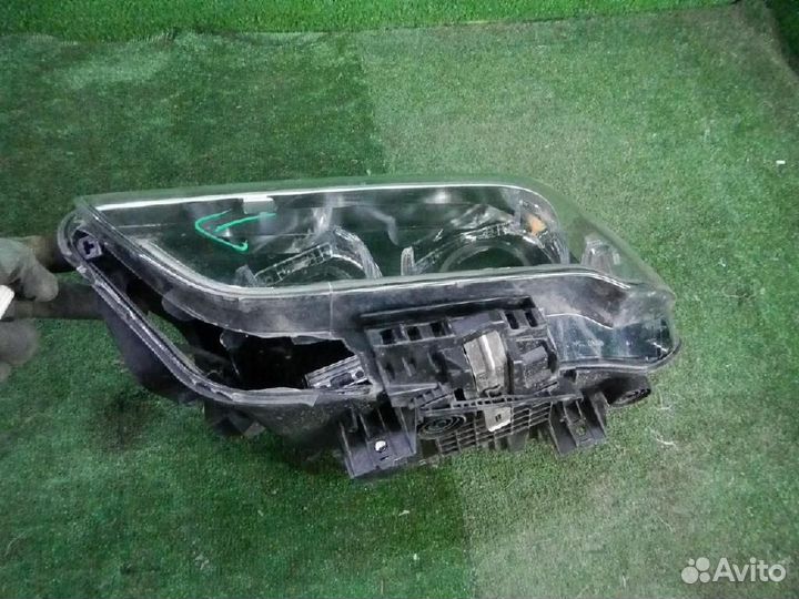 Фара левая BMW X1