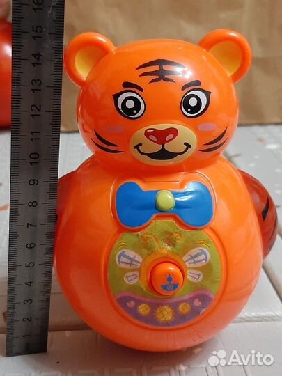 Игрушка неваляшка музыкальная