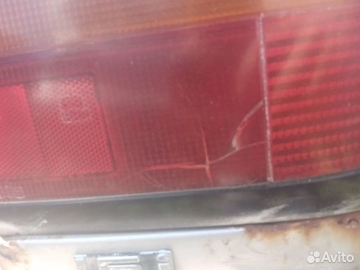 Фонарь задний наружный Honda Concerto