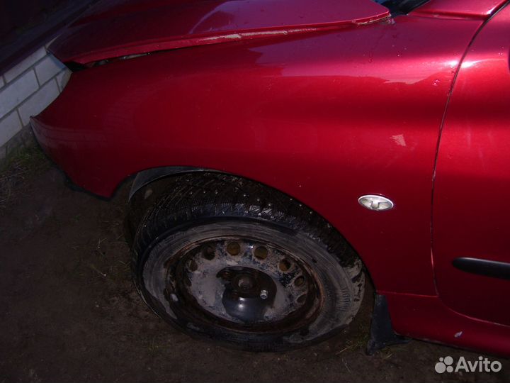 Пежо 206 крыло левое