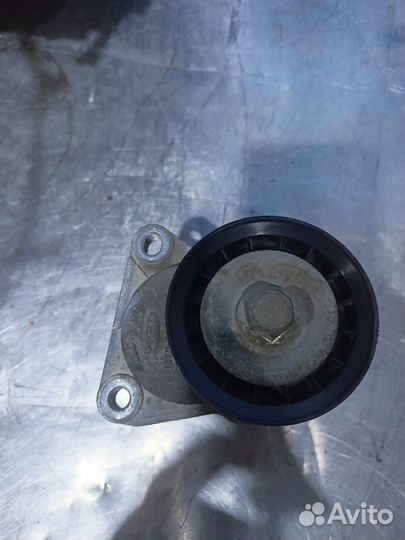 Форд Мондео 4 натяжитель ремня генератора 2,0