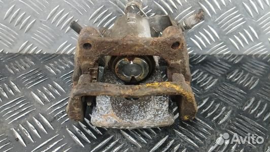 Суппорт тормозной задний правый opel zafira B (HNK08OO01)