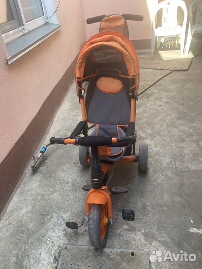 Трехколесный велосипед с родительской ручкой
