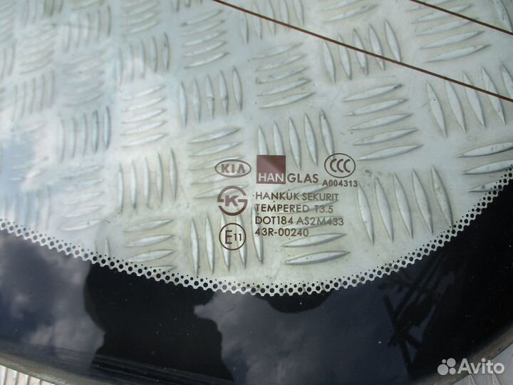Стекло заднее Kia Spectra
