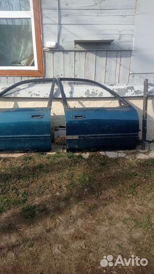 Бампер задний на мазда 626