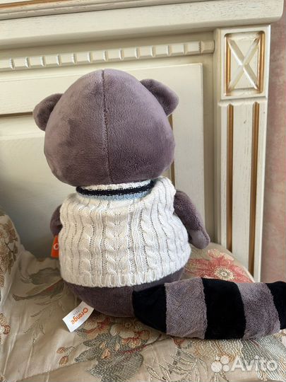 Енот плюшевый