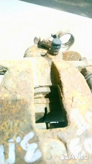 Суппорт тормозной задний правый Kia Rio 3 2013