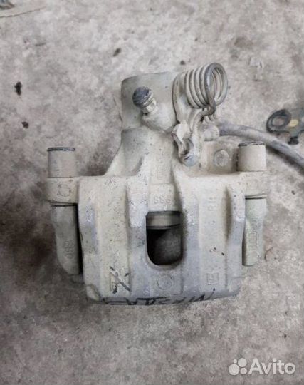 Суппорт задний правый Mazda 3 bk