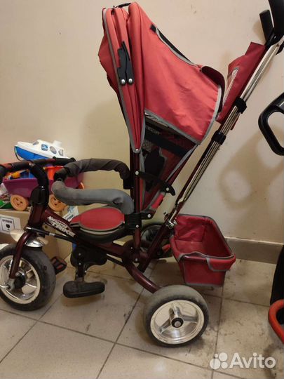 Трехколесный велосипед с ручкой