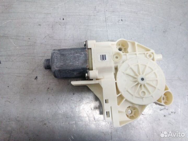 Моторчик стеклоподъемника передний левый Ford