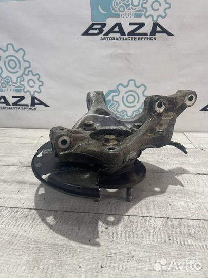 Кулак передний левый Chevrolet Cruze