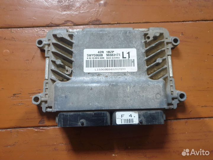 Блок управления двигателем Chevrolet Aveo T255 1.2