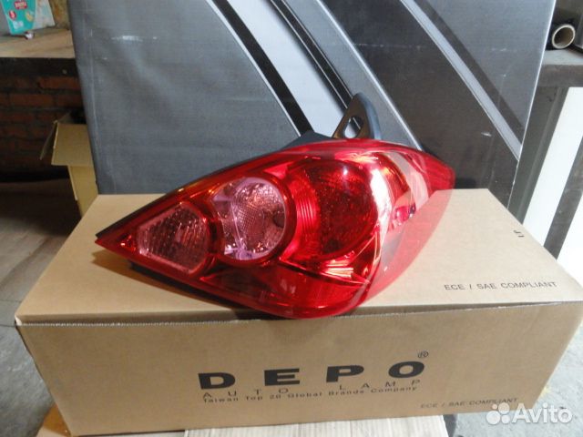 Tiida (5 ) Фонарь задний внешний правый (5 дв) (De