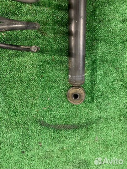 Амортизатор задний Toyota Bb QNC21 3SZ-VE 2009