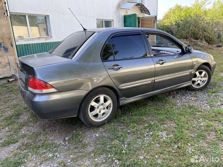 Mitsubishi Lancer 1.6 МТ, 2006, 330 000 км