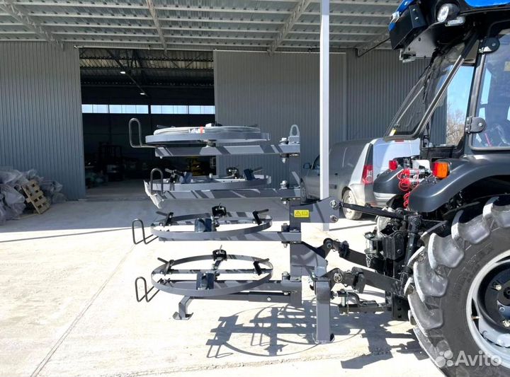 Размотчик проволоки на трактор