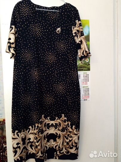 Платья и костюмы женские