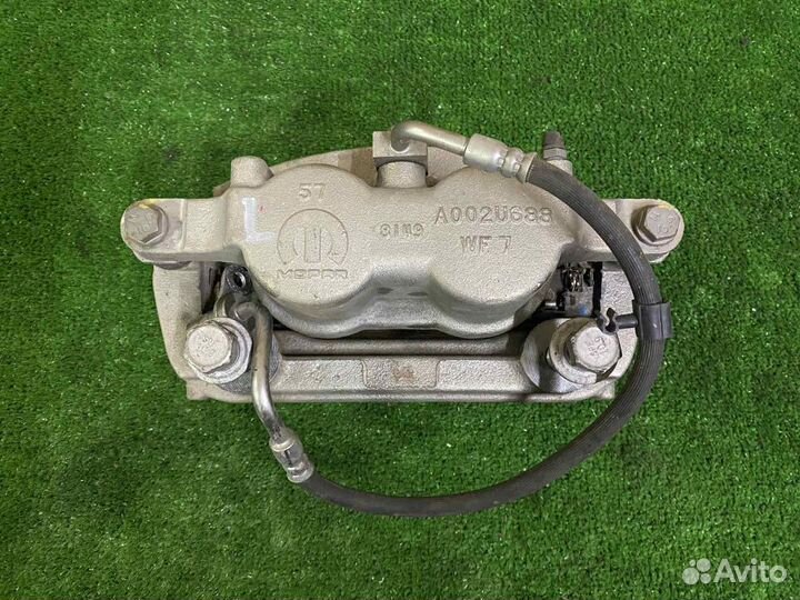 Dodge RAM 2019- суппорт тормозной передний левый