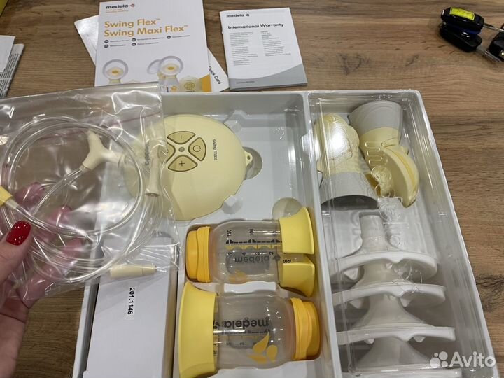 Молокоотсос medela swing maxi flex
