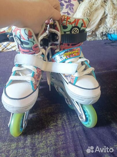 Роликовые коньки