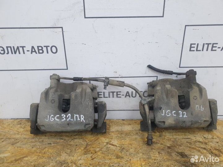 Суппорт тормозной передний правый Jeep Grand