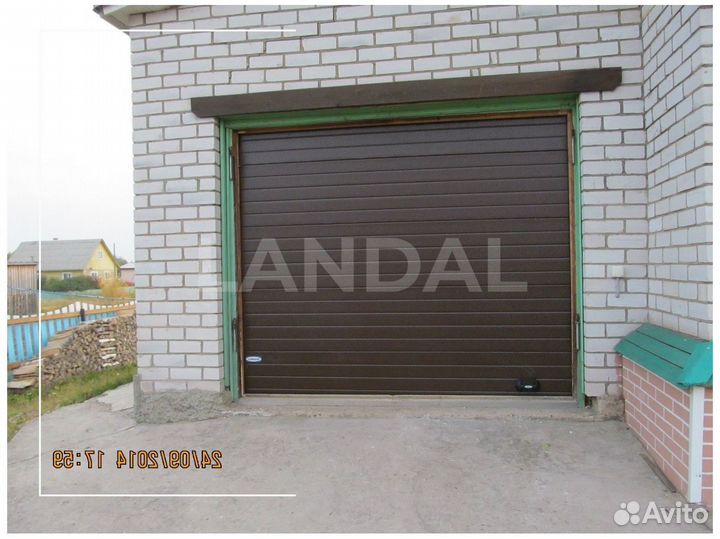 Секционные подъёмные гаражные ворота