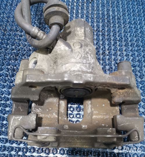 Суппорт Mazda Axela