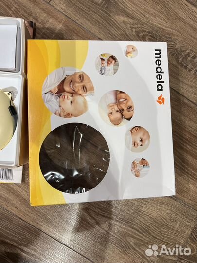 Молокоотсос medela электрический