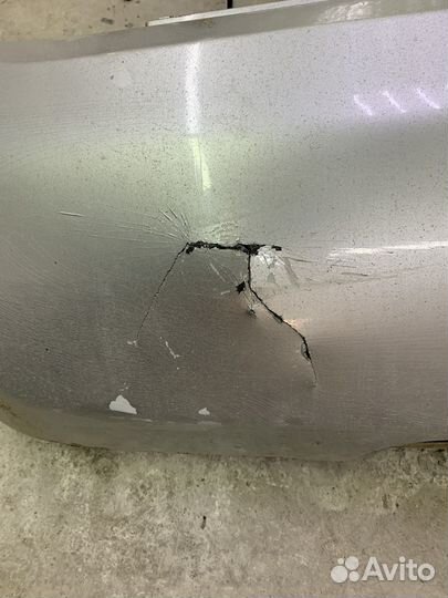 Бампер задний Nissan March K12