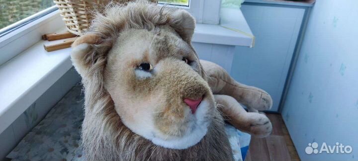 Большая мягкая игрушка лев