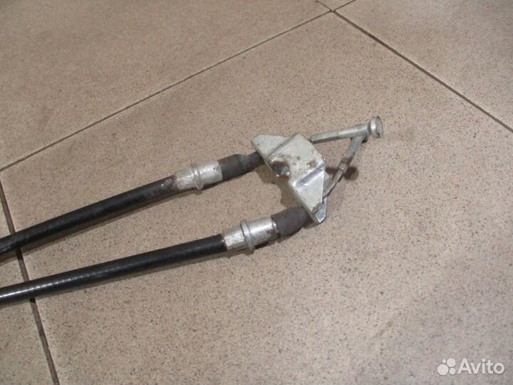 Трос стояночного тормоза Opel Astra G