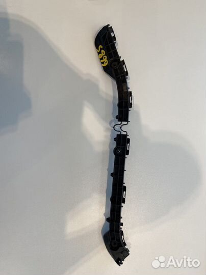 Крепление бампера, зад.лев. Toyota Corolla NZE 164