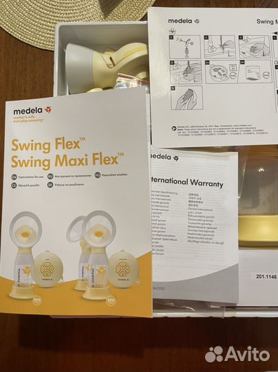 Молокоотсос medela swing maxi flex