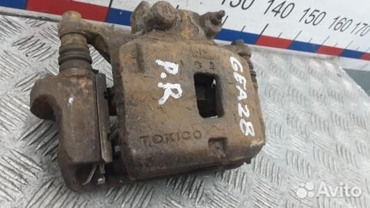 Суппорт тормозной передний правый mitsubishi L200