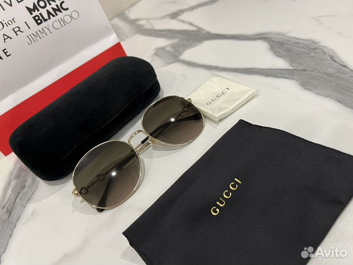 Солнцезащитные очки Gucci