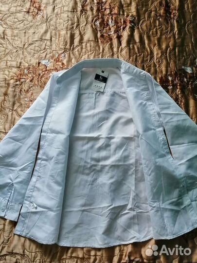 Продам новую рубашку на мальчика 164-170
