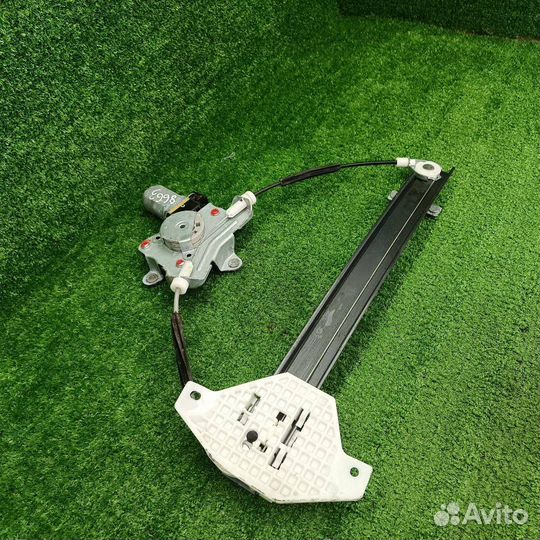 Моторчик стеклоподъемника задний левый SsangYong 2