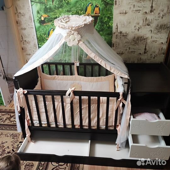 Детская кроватка с поперечным маятником