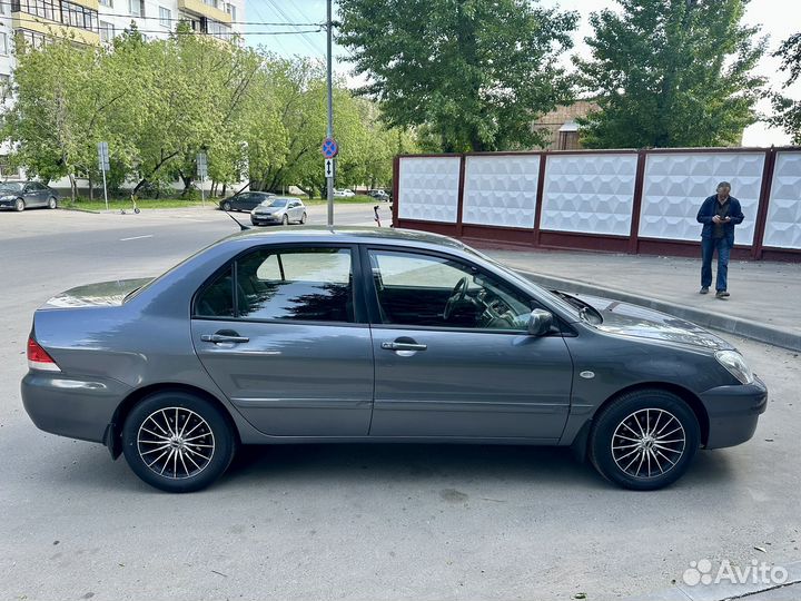 Mitsubishi Lancer 1.6 МТ, 2009, 124 530 км