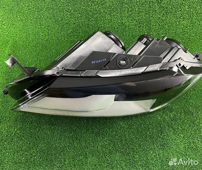 Фара левая Volkswagen Passat B7