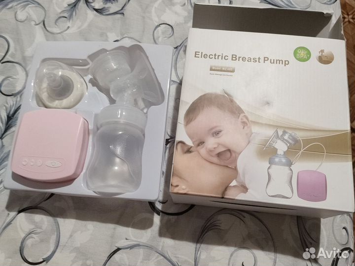 Молокоотсос электрический новый