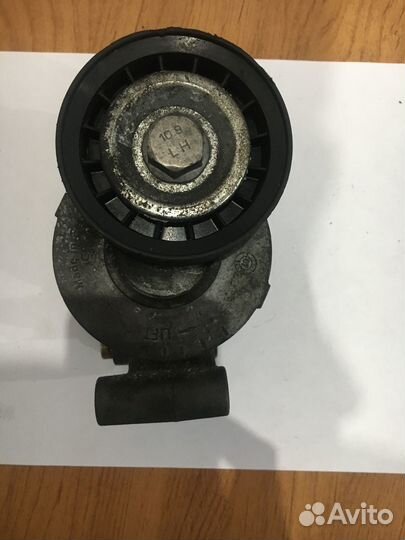 Натяжитель приводного ремня Ford