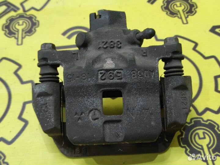 Суппорт задний правый Subaru Legacy BLE EZ30D