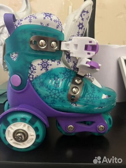 Роликовые коньки