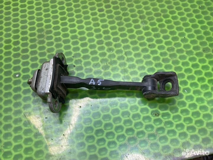 Задний левый ограничитель октавия а5