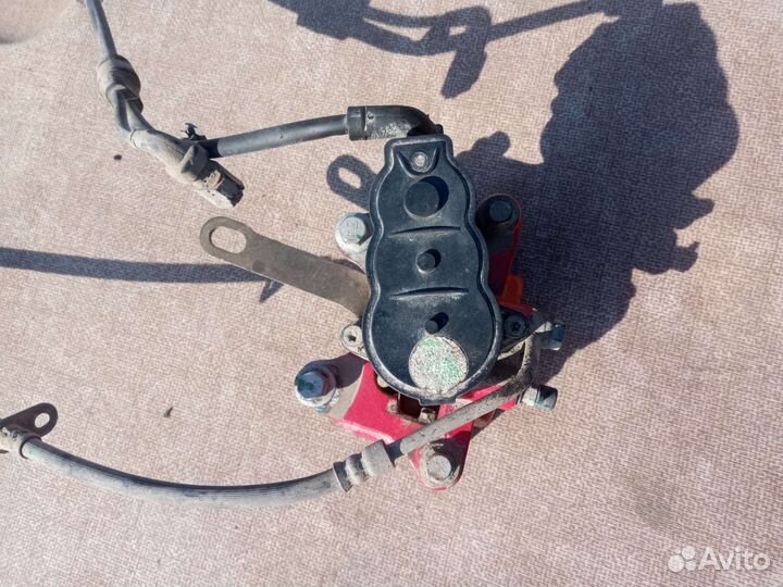 Суппорт задний левый Geely Coolray SX11