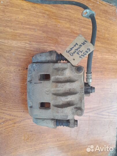 Суппорт передний Subaru Outback BR/B14