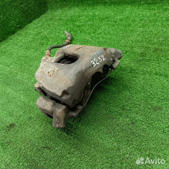 Суппорт тормозной передний левый Mazda 3 BK 2005